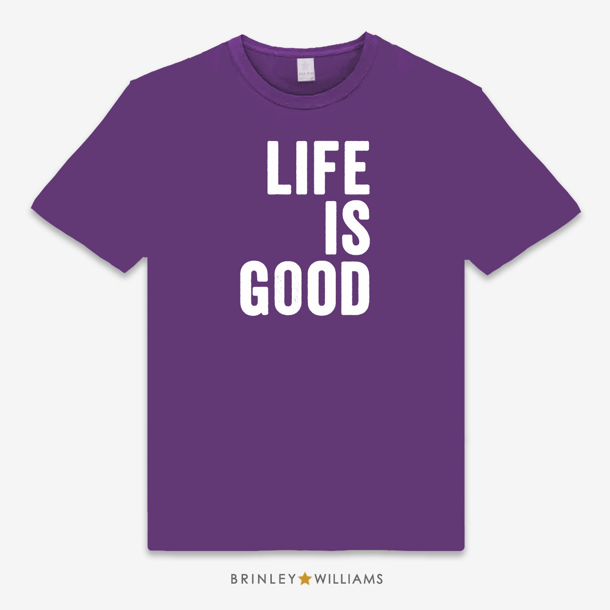 Purple t-shirt with 'LIFE IS GOOD' text on a white background
