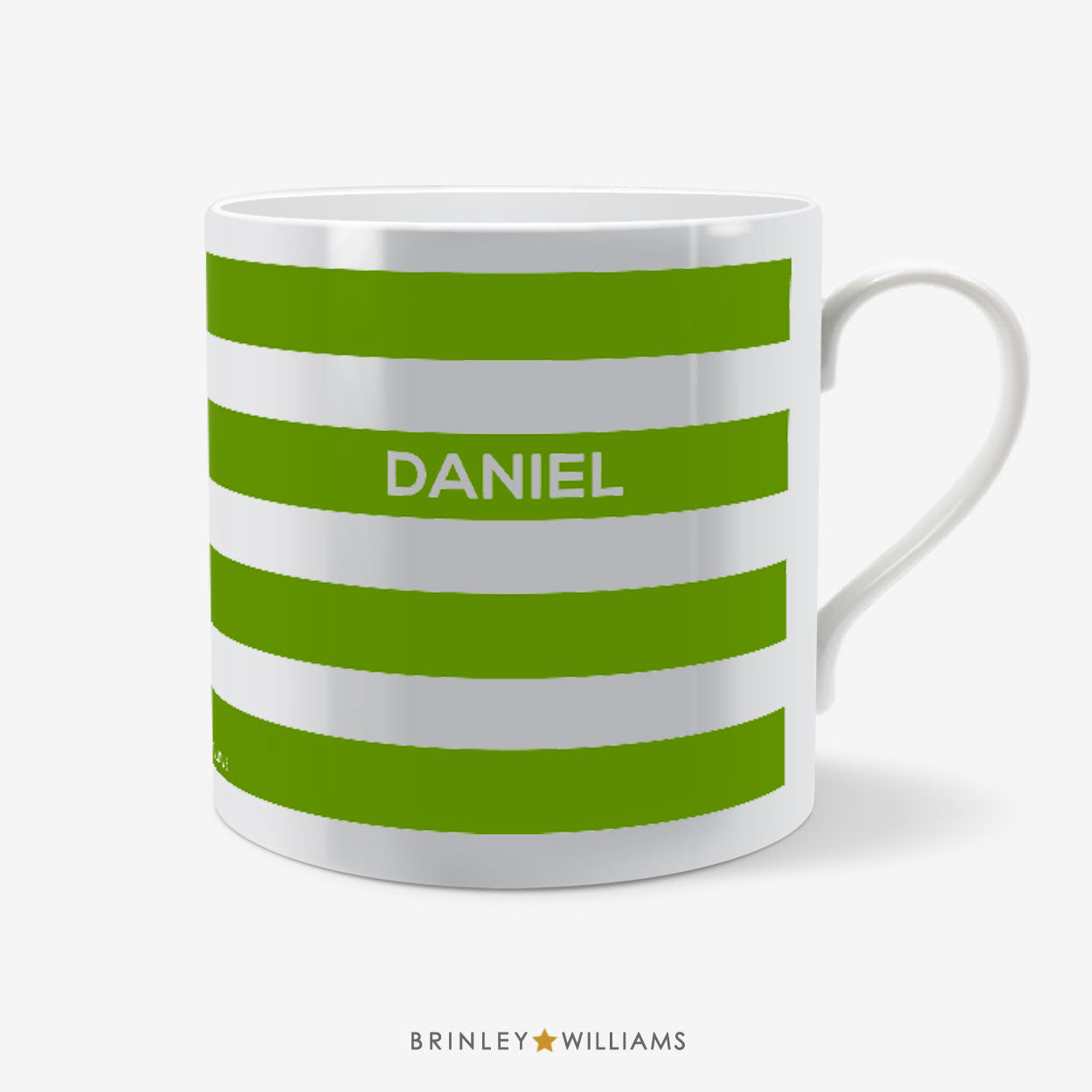 White mug with green stripes and 'DANIEL' printed on a white background