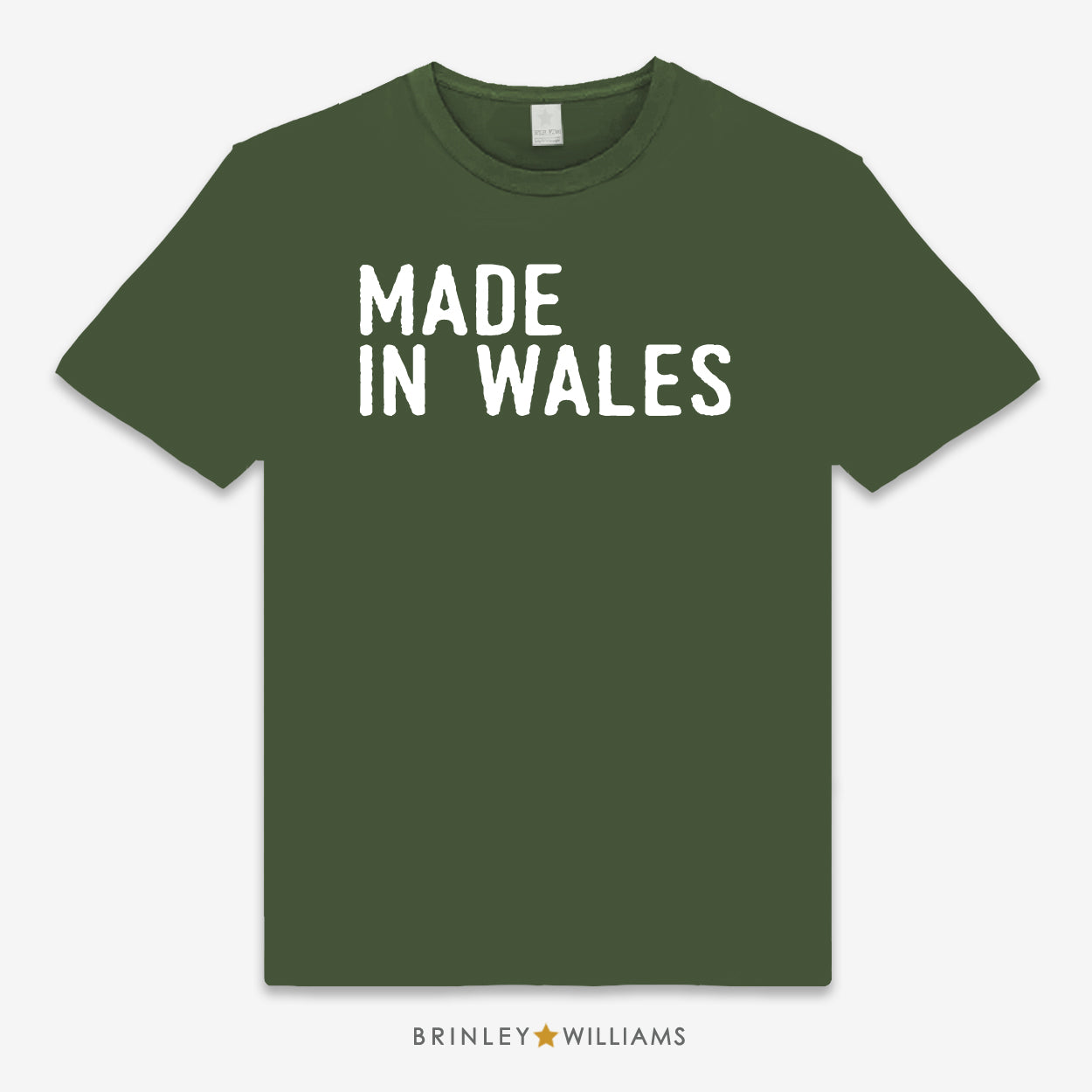 Green unisex t-shirt printed with 'MADE IN WALES' white text design