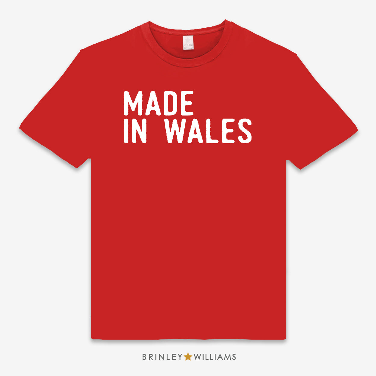 Red unisex t-shirt printed with 'MADE IN WALES' white text design