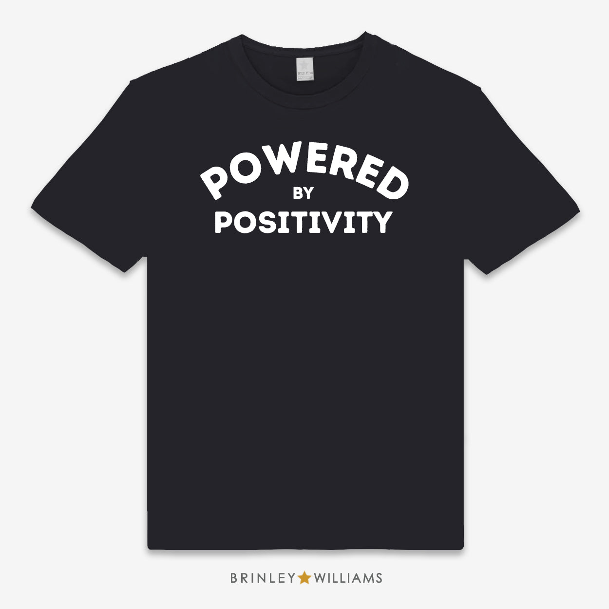 A Black unisex t-shirt with the text 'POWERED BY POSITIVITY' printed on the front.