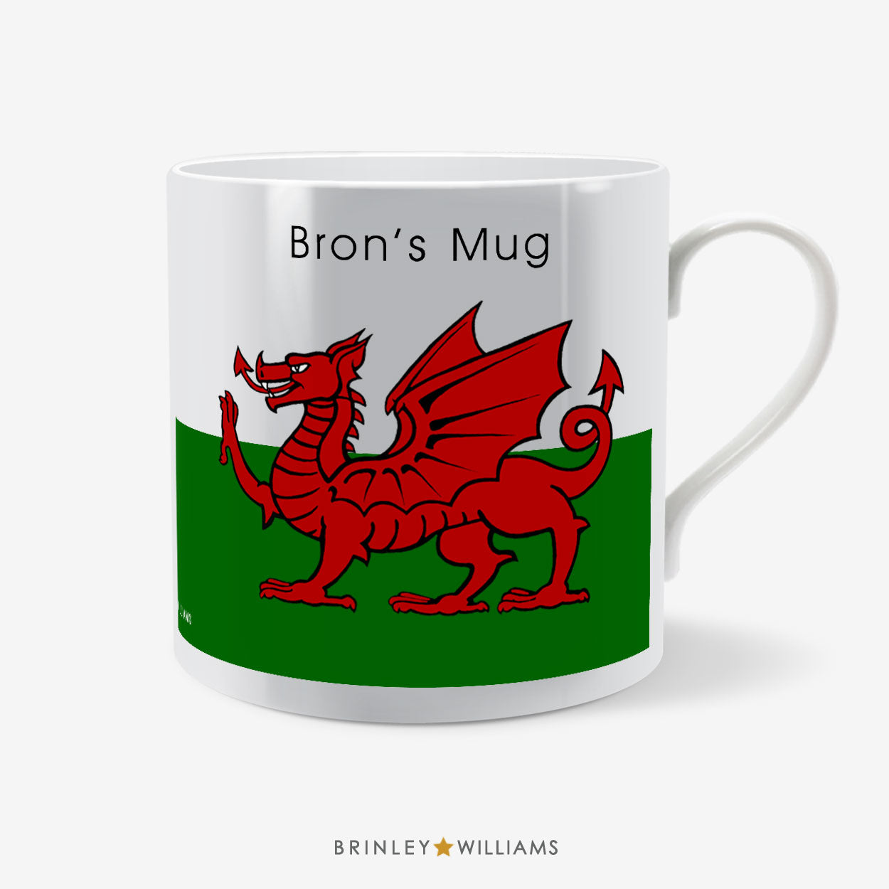 Mug with red dragon design on a green and white background, featuring the text 'Bron's Mug' and 'Brinley Williams'.